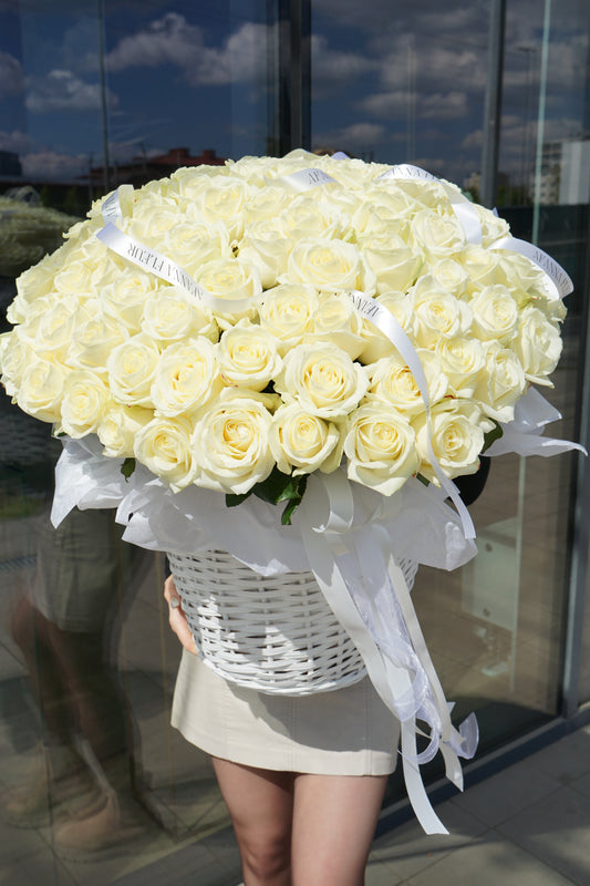 A basket of white roses