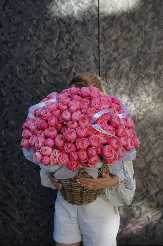 Basket of peony roses