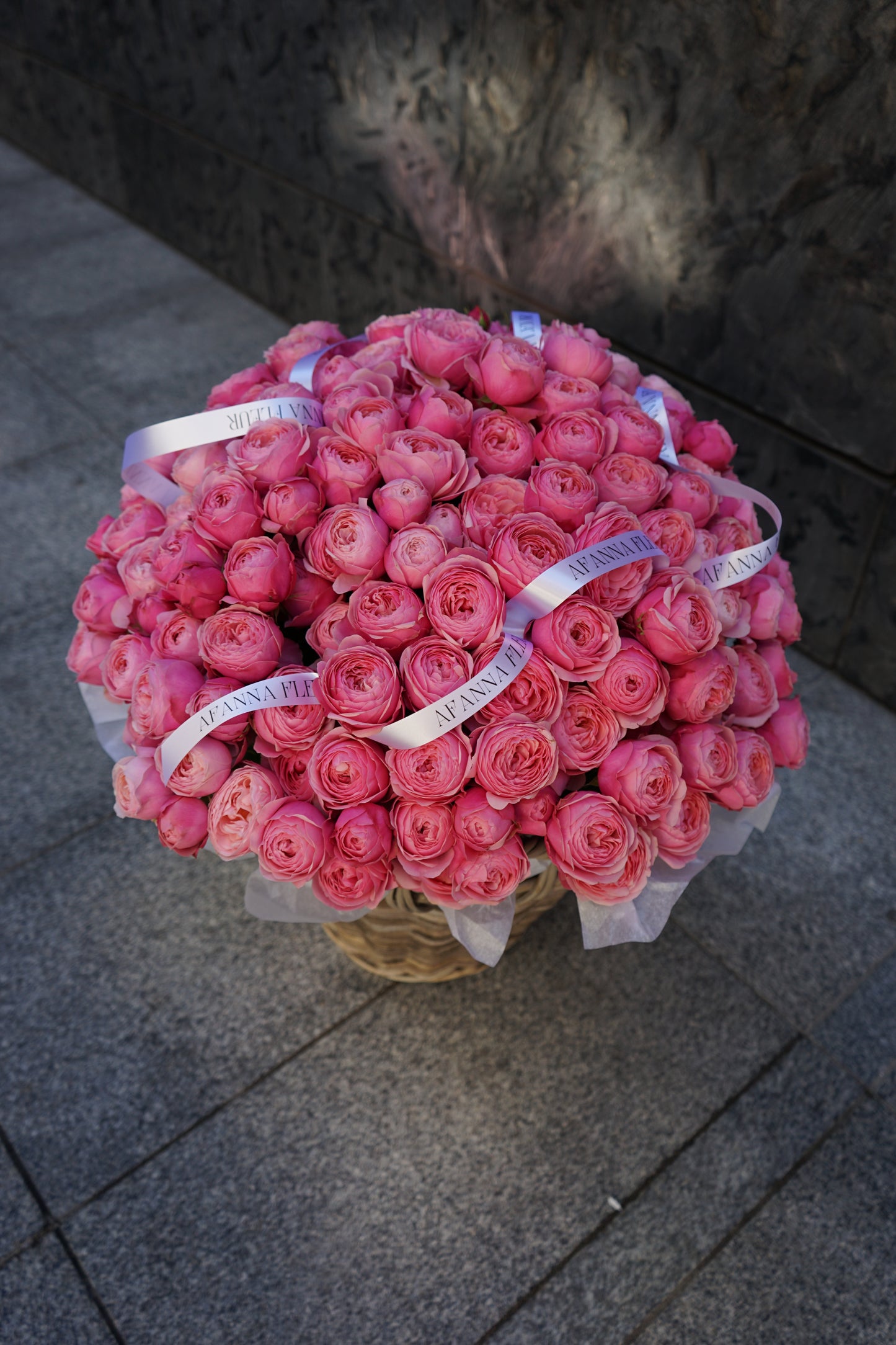 Basket of peony roses